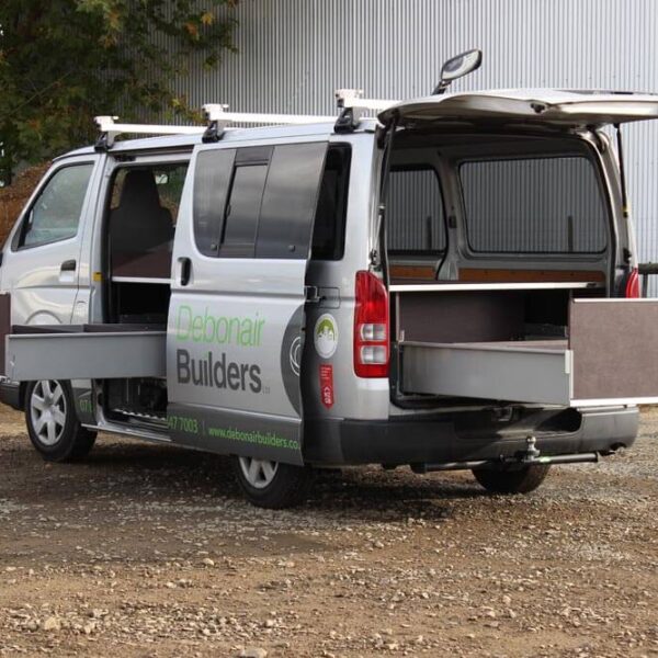 Construction Fitouts Single Custom Height Drawers fitted in rear and side door of van with false floor above
