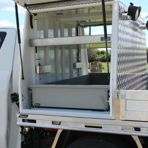 Toyota Landcruiser Drainage Fitout 1200L Toolboxes, Flat Deck, Front + Rear H-Rack, Underdeck Compressor