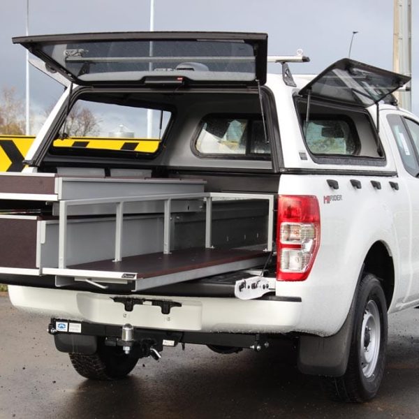 Half width drawer and Roll-a-table with side bar for gas and chemical storage